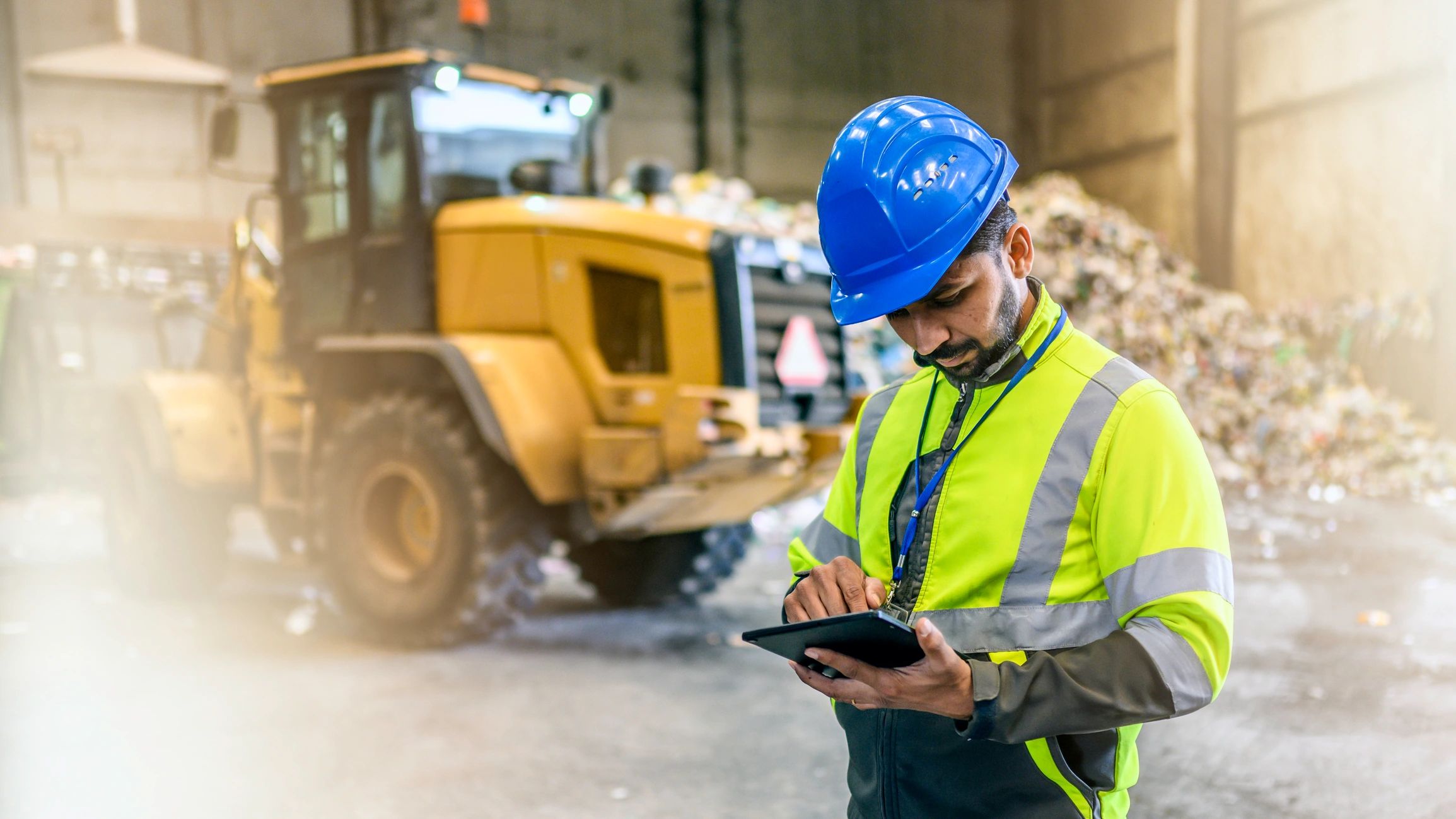 Engineer reviewing technical data for service planning